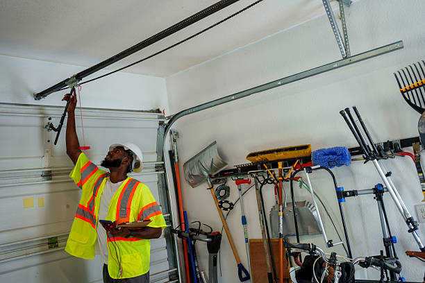 Professional Garage Door Panel Replacement technician working in Hermantown, MN